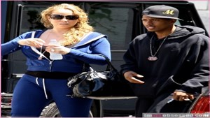 Mariah_Carey_And_Nick_Cannon_Studio_YSL_tribute_easy_1
