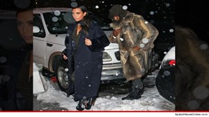 0216-kim-kanye-coat-4