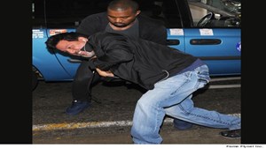 0719-kanye-west-pap-article-3