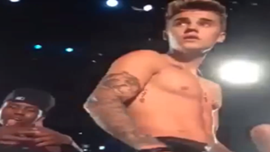 justin-bieber-hit-by-bottle
