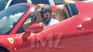 kobe-bryant-ferrari-cell-phone