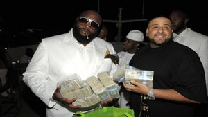 rick-ross-with-money-stacks
